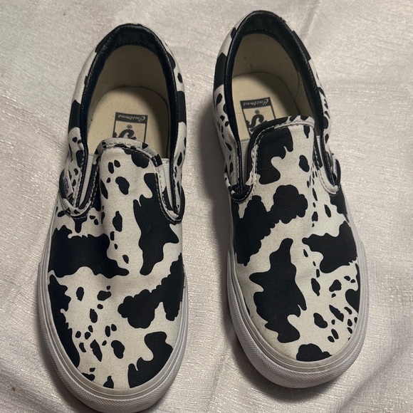 Women’s Vans Black and White Cow Print Slip-On Sneakers - Picture 1 of 3